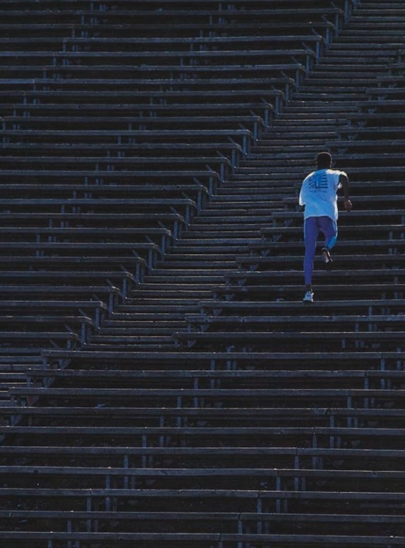 Coach guiding athlete - philosophy